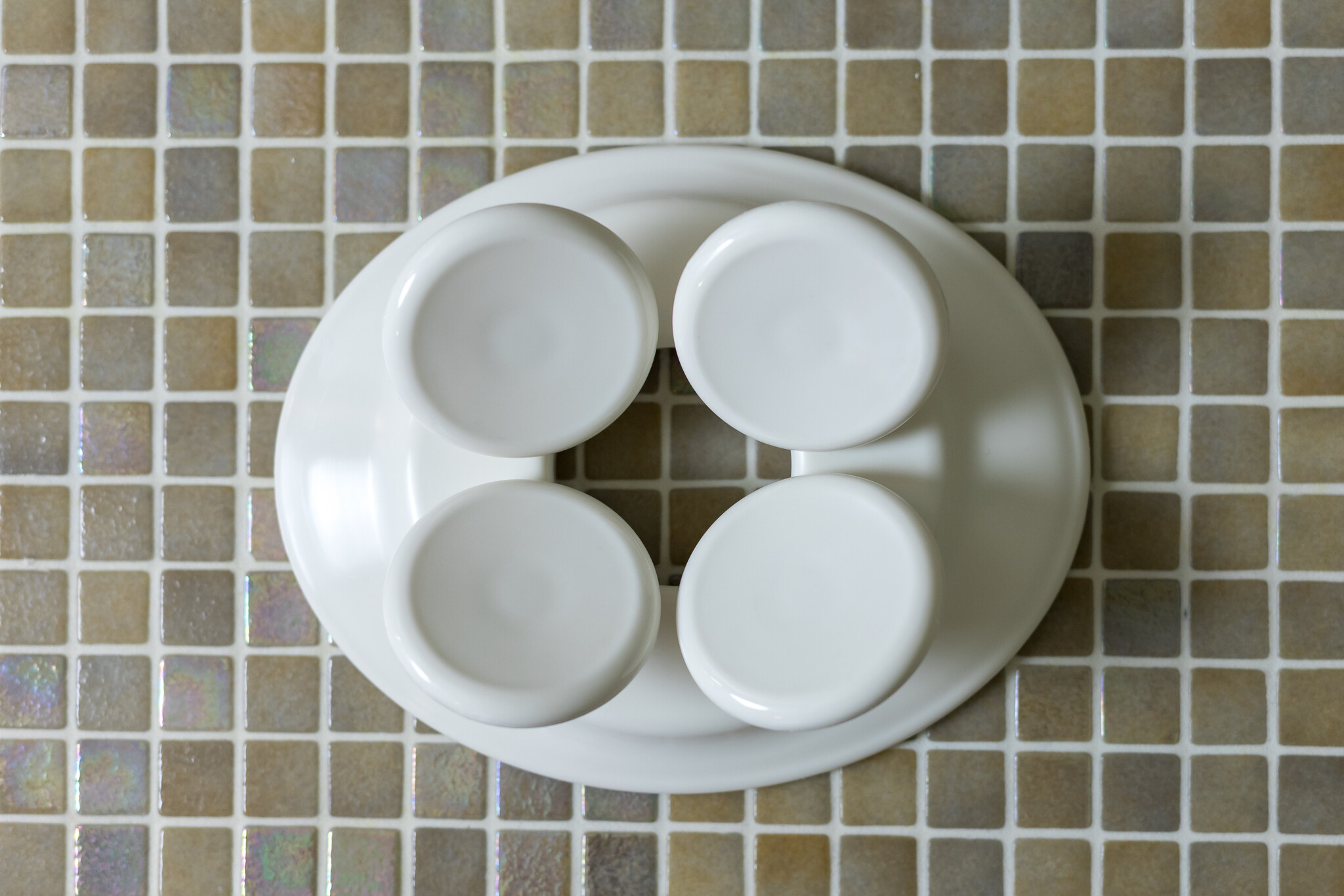 Schotelmodel hoofdsteun wit kunststof