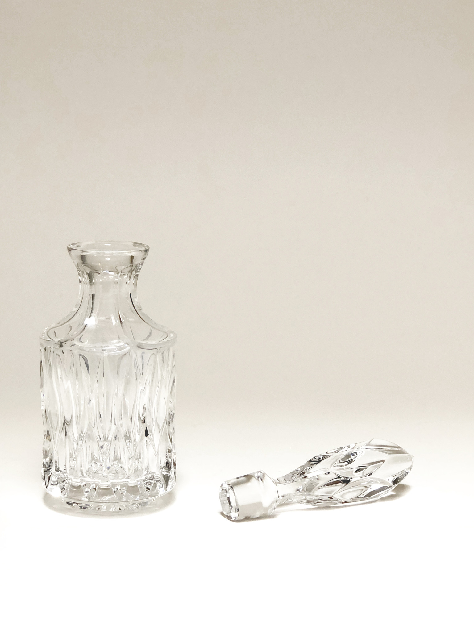 Vintage glass bottle with high bottle stopper Curiosa