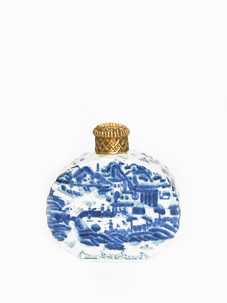 Blue white porcelain bottle with brass cap