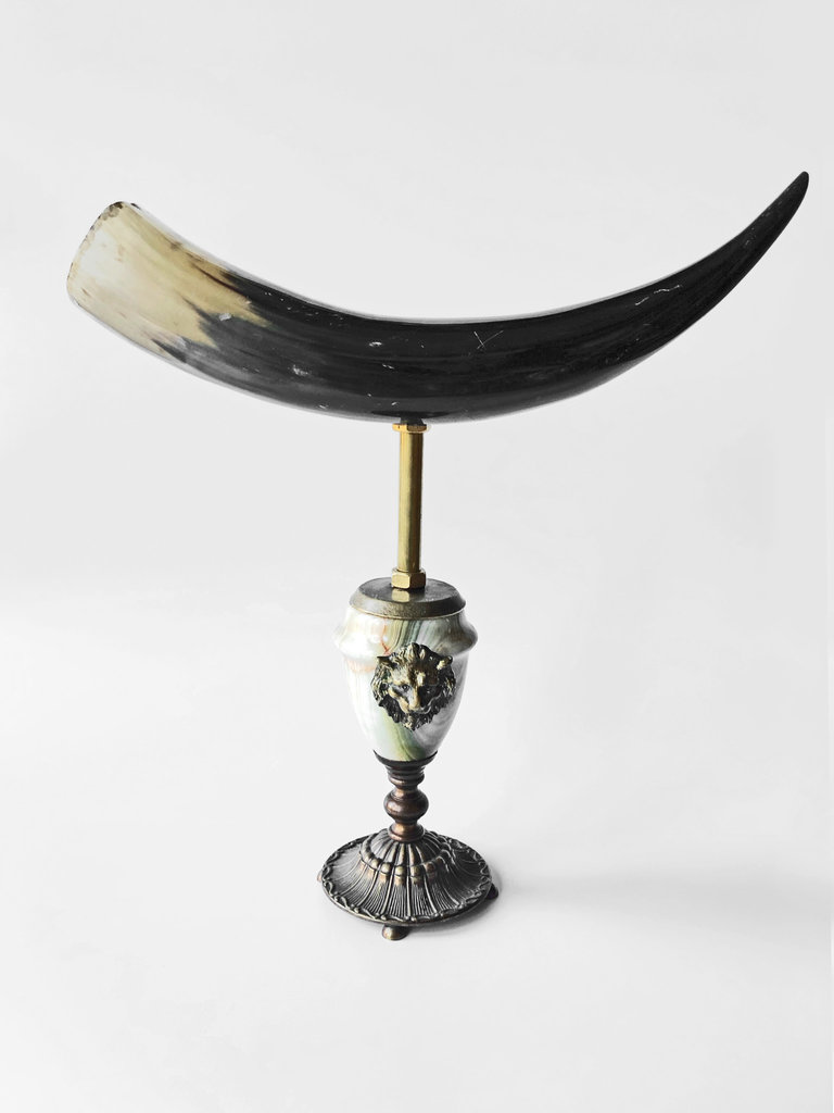 Atelier AJvB Horn on onyx and bronze base with lionhead ornament