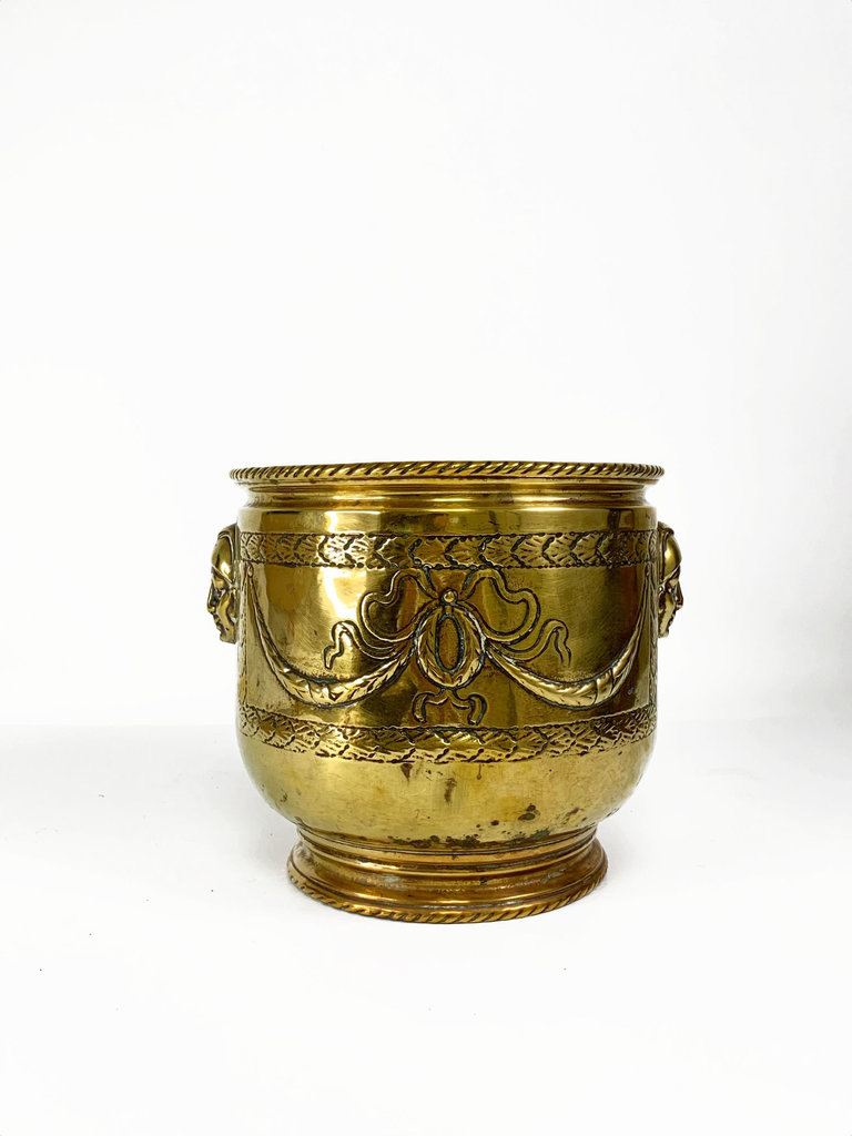 Vintage Copper planter decorated with faces in relief