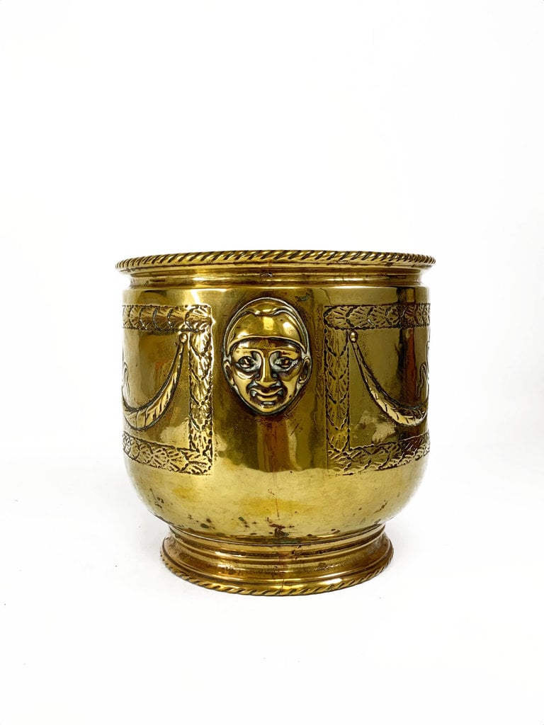 Vintage Copper planter decorated with faces in relief