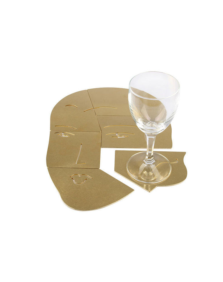 The Empathist Brass puzzle coaster set