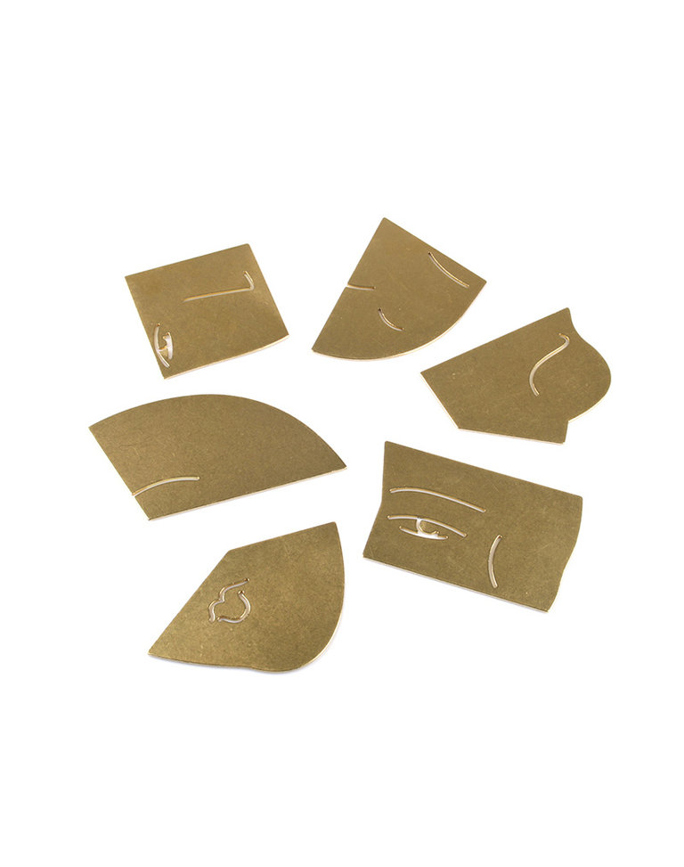 The Empathist Brass puzzle coaster set