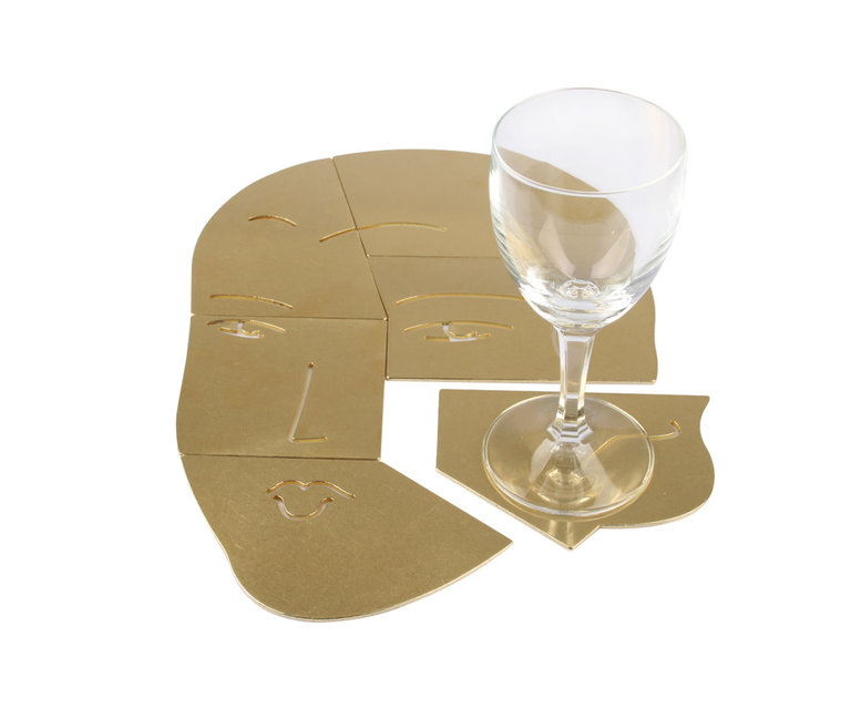 The Empathist Puzzel onderzetter set van messing