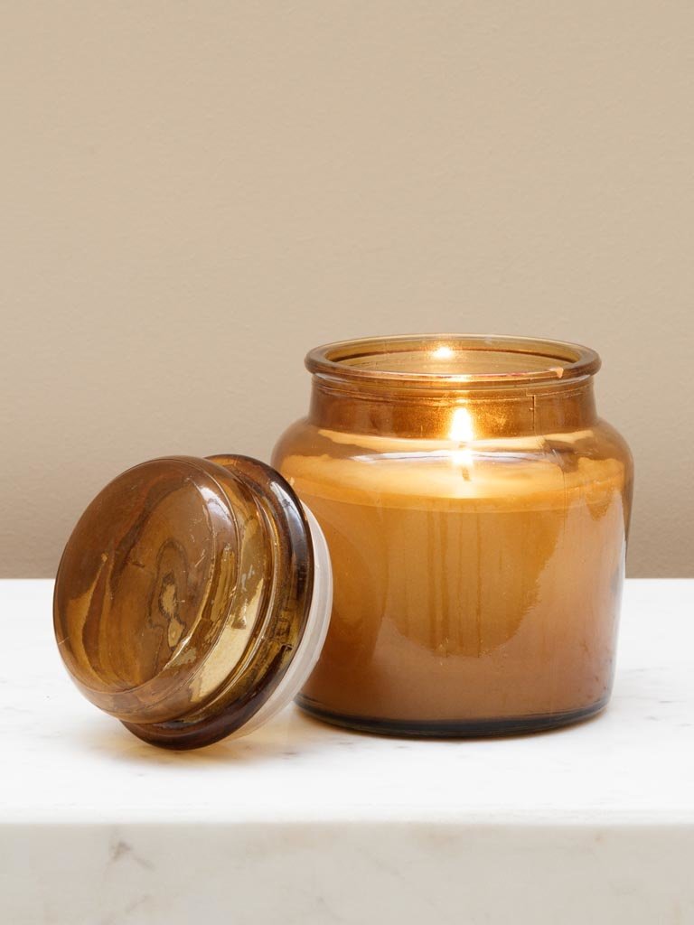 Large amber jar with candle