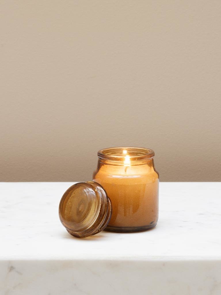 Small amber jar with candle