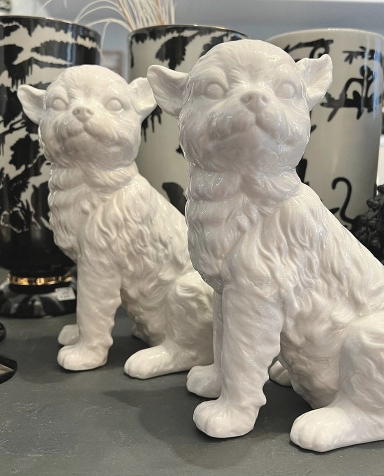 White porcelain sitting dog statue