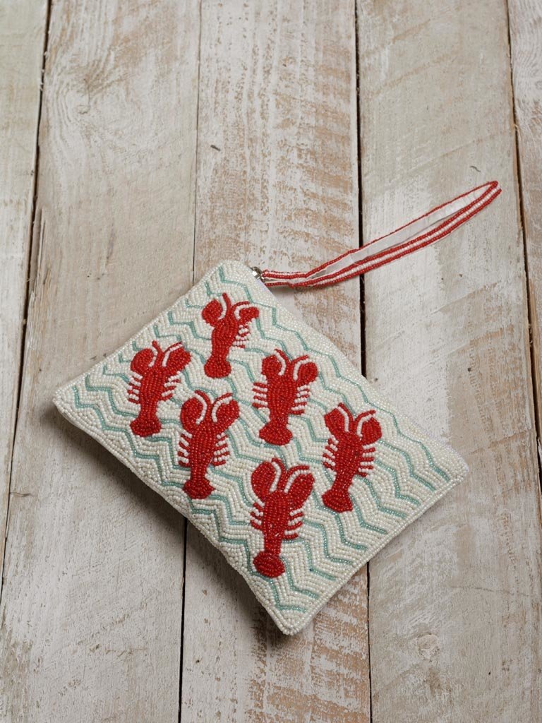 Zipped pouch with beaded lobsters