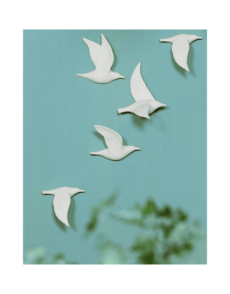 Set of five white  porcelain wall birds