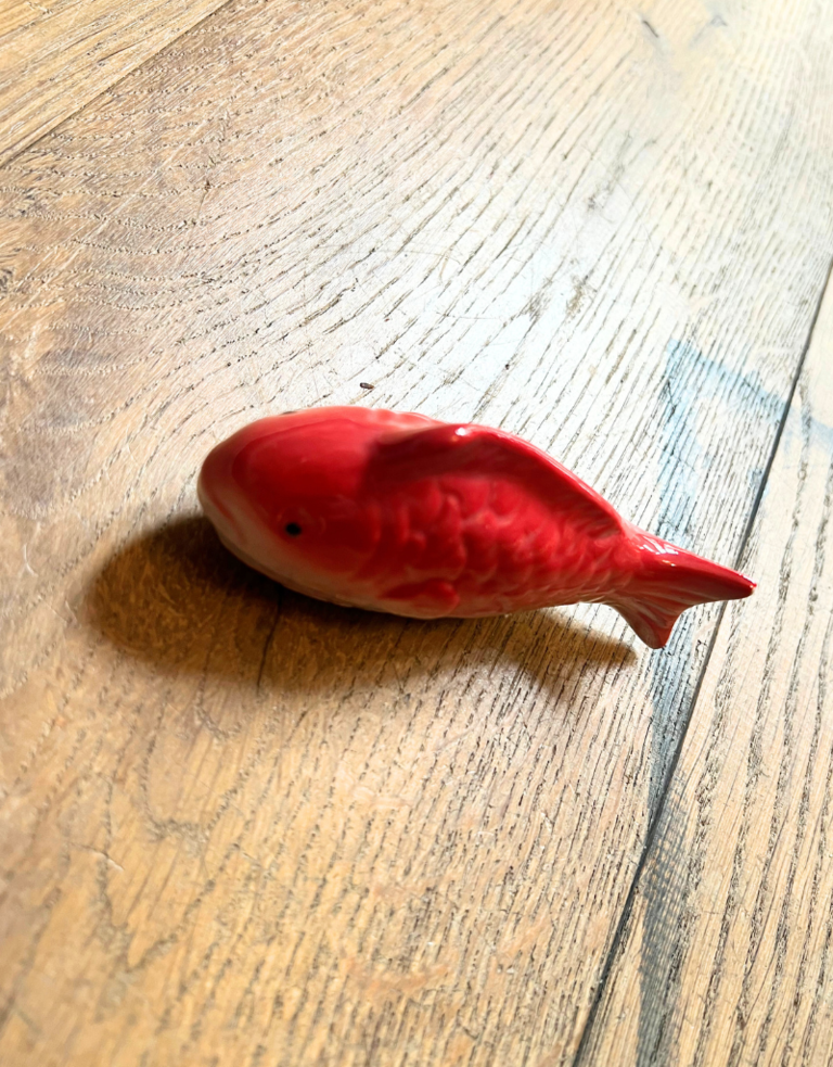 Porcelain gold fish statue