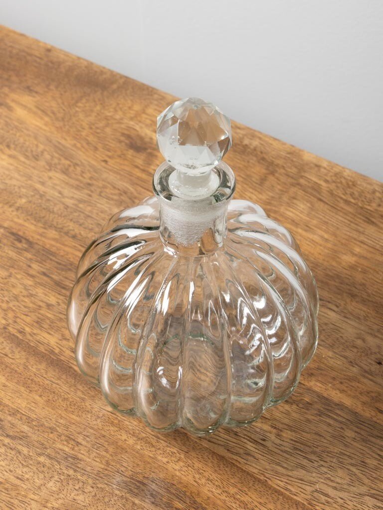 Small clear glass round carafe with stripes and stopper