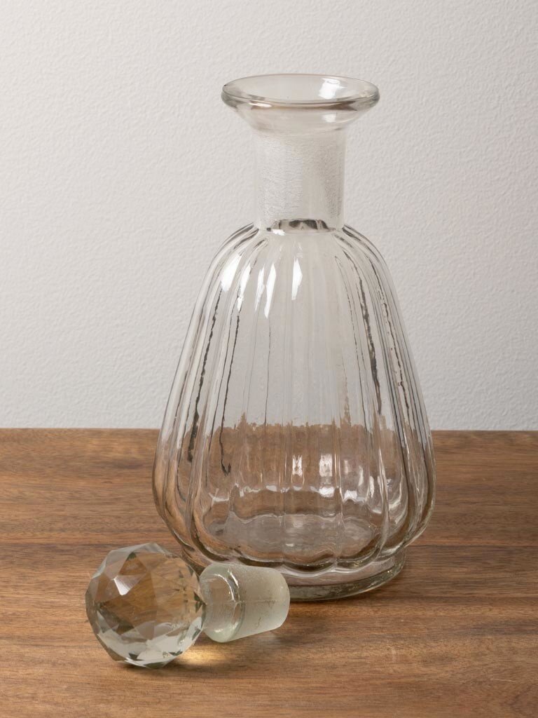 Round clear glass carafe with stripes and stopper