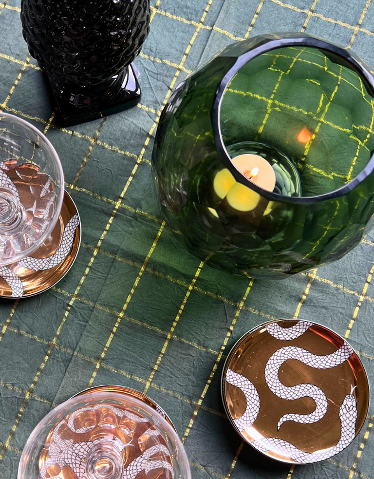 Green thick-walled glass candle holder