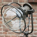 Van Manen Metalen vloerlamp met een glazenbol op een statief