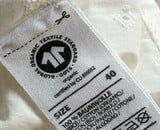 Wat betekent GOTS eigenlijk? Het belangrijkste keurmerk voor duurzame kleding uitgelegd 