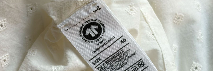 Wat betekent GOTS eigenlijk? Het belangrijkste keurmerk voor duurzame kleding uitgelegd 