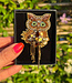 FAIRTRADE broche UIL met pailetten en kralen