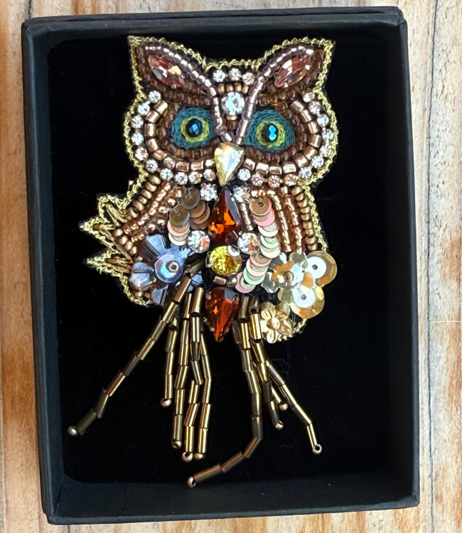 FAIRTRADE broche UIL met pailetten en kralen