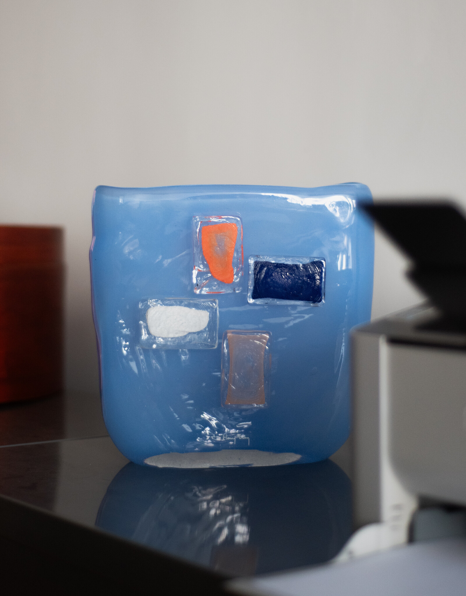 Blue glass vase with glass shaped
