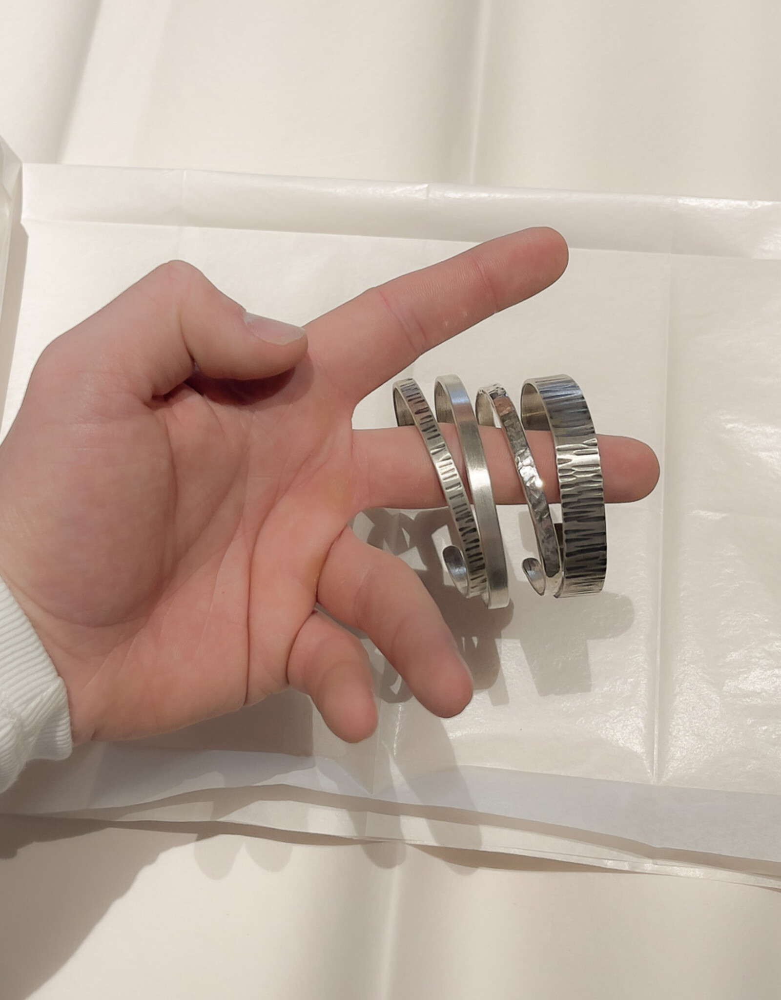 Handcrafted Silver Bracelets with Unique Textures and a Timeless Minimalist Look