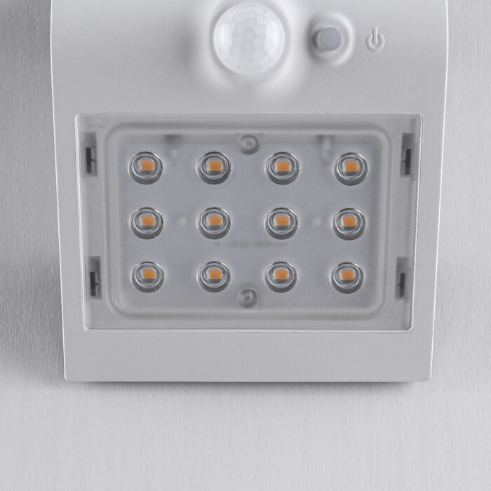 Solar wall lamp with sensor Alien 1,5W - white