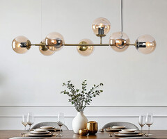 Design-Hängeleuchte Sette mit amber Glaskugeln