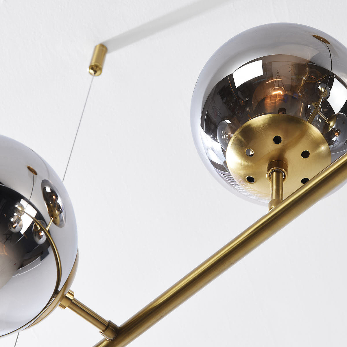 Design-Hängelampe Hepta mit Rauchglas-Kugeln