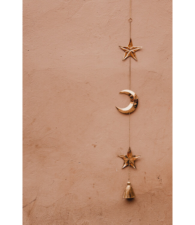 Messing slinger Over the Moon