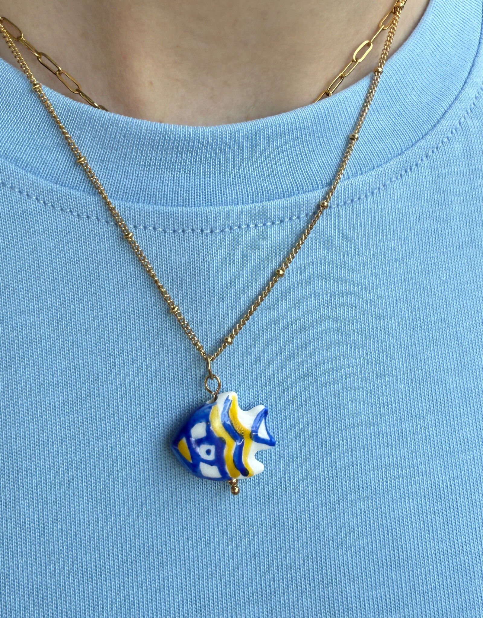 The Golden House Dodi Ketting  'Blue Fish' - Gold