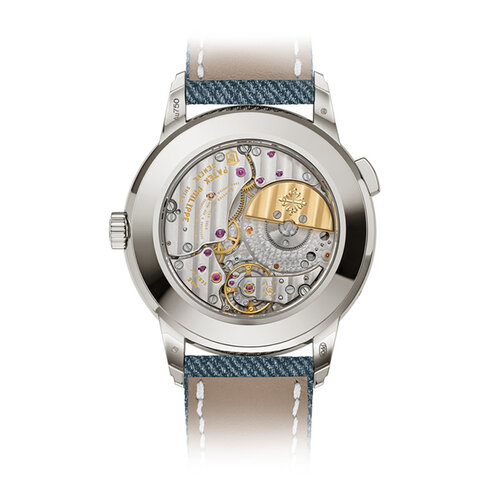 Patek Philippe Complications World Time Date in witgoud Leon Martens Juwelier