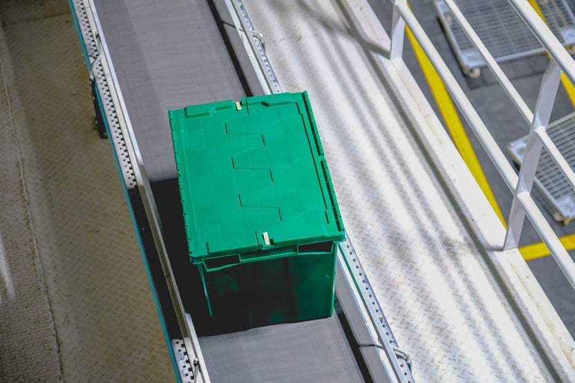 Attached Lid Toto Box on Conveyor Belt