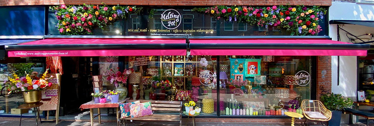 WINKEL UPDATE: Nieuwe luifels, etalage & vrolijke bloemengevel