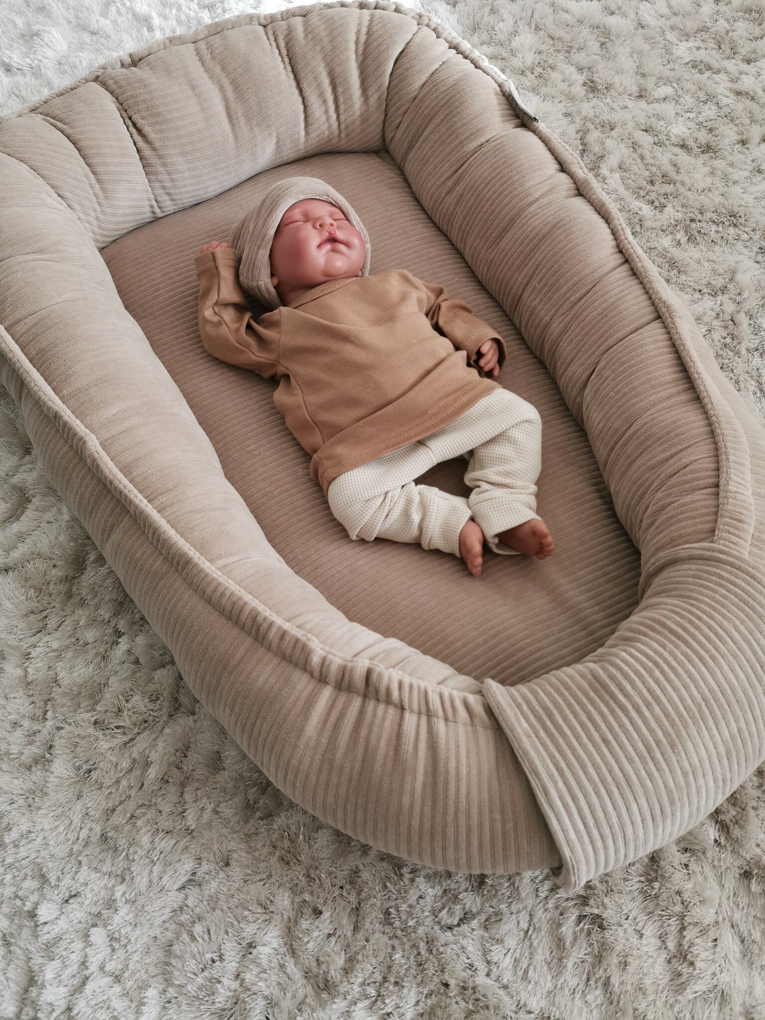 https://cdn.webshopapp.com/shops/282239/files/435221783/babynest-rib-dark-beige.jpg