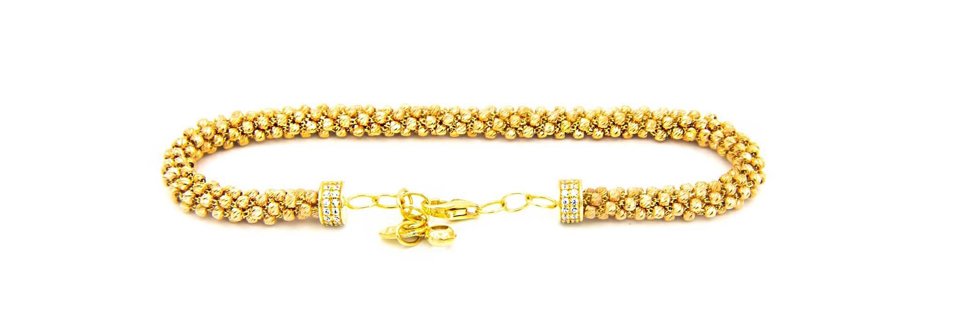 Armband flexibele band rondom bezet met diamond cut balletjes
