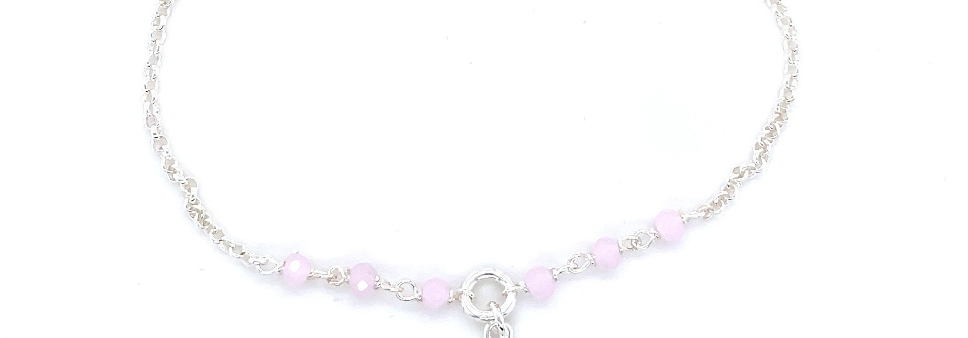 Armband met roze kraaltjes en kruisje ingelegd met zirkonia's zilver