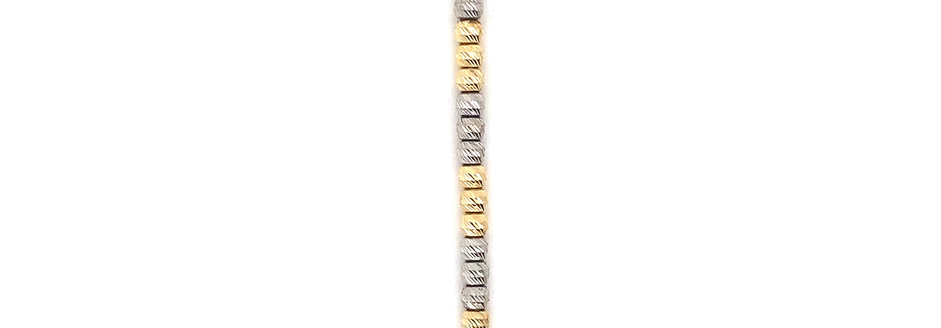 Armband bicolor met diamond cut balletjes en zirkonia's