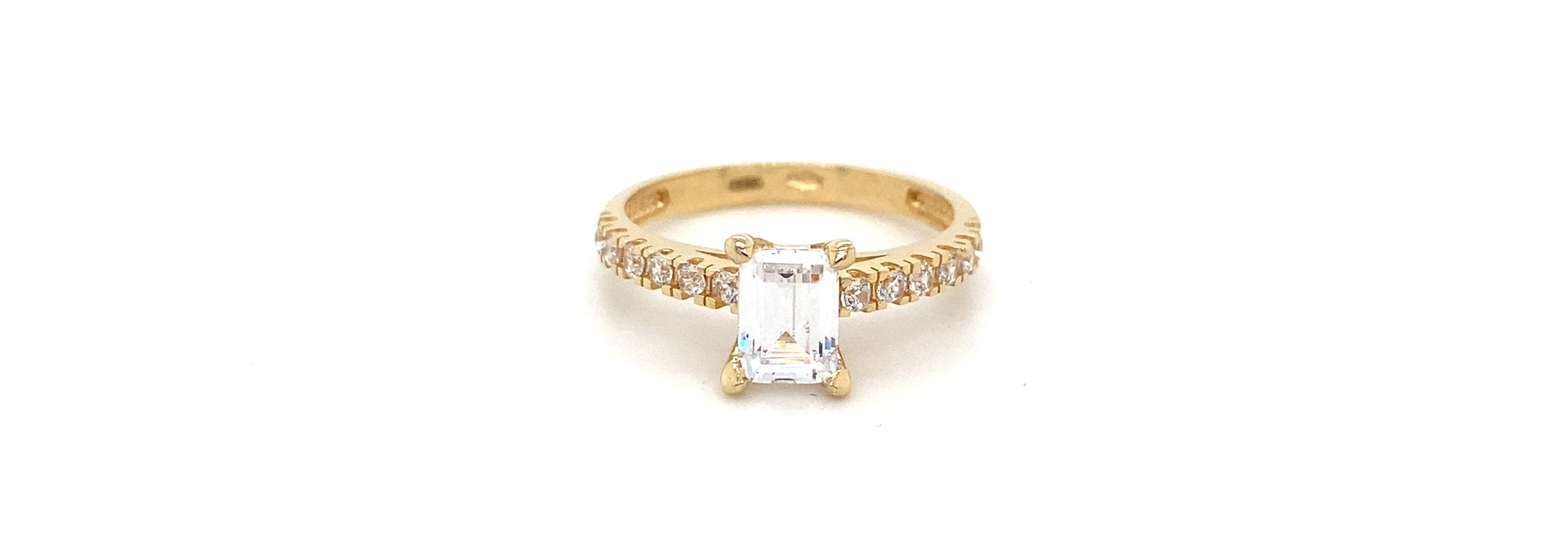 Ring halve band zirkonia's met solitaire baguette steen