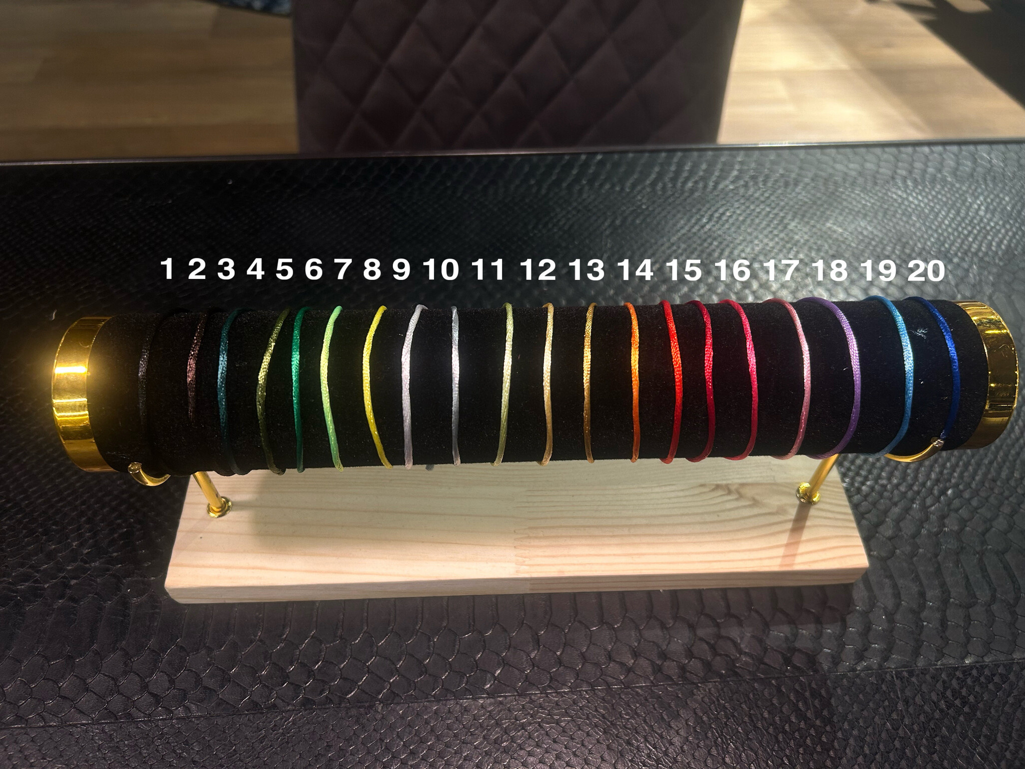 Armband zwart koord met revolver-2