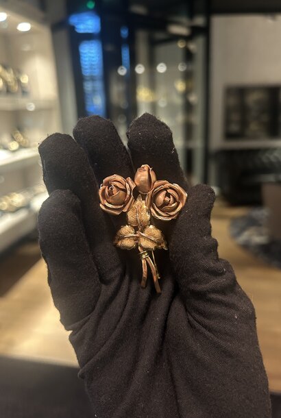 Broche Roos