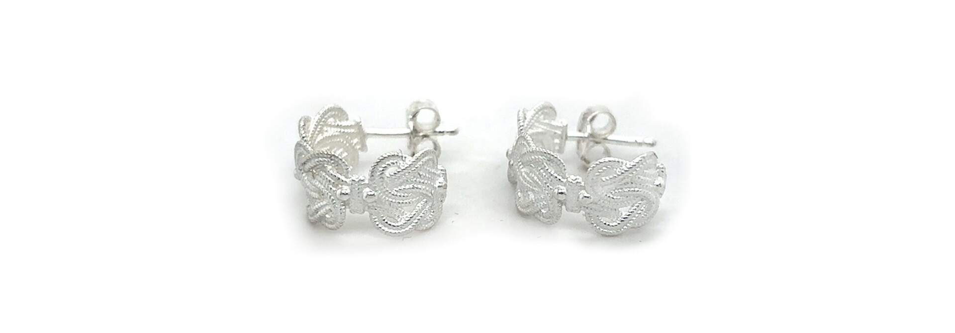 Oorbellen boogjes mattenkloppers zilver