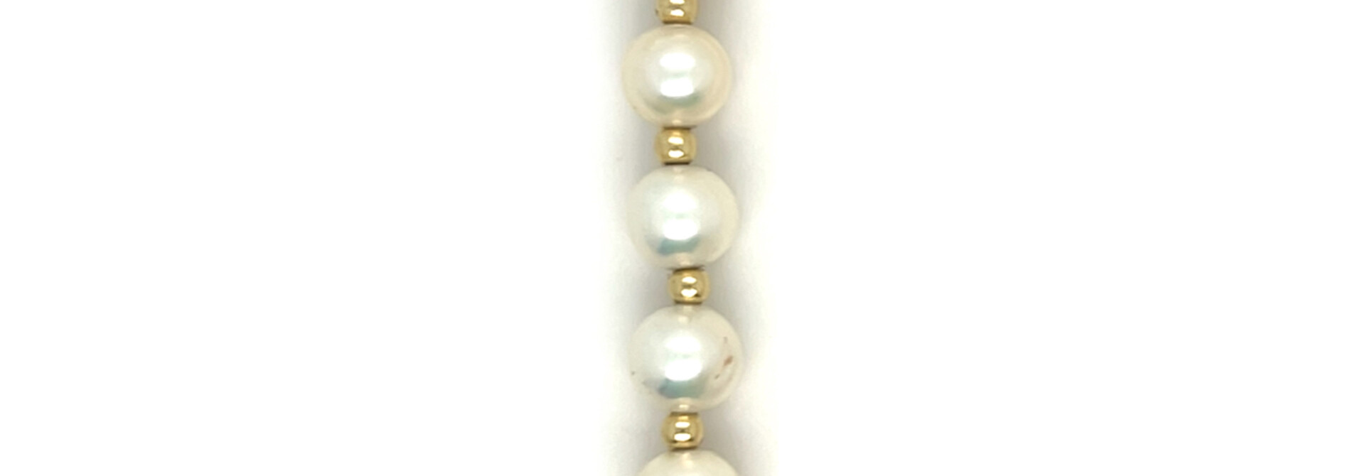 Armband ronde parels met gouden balletjes