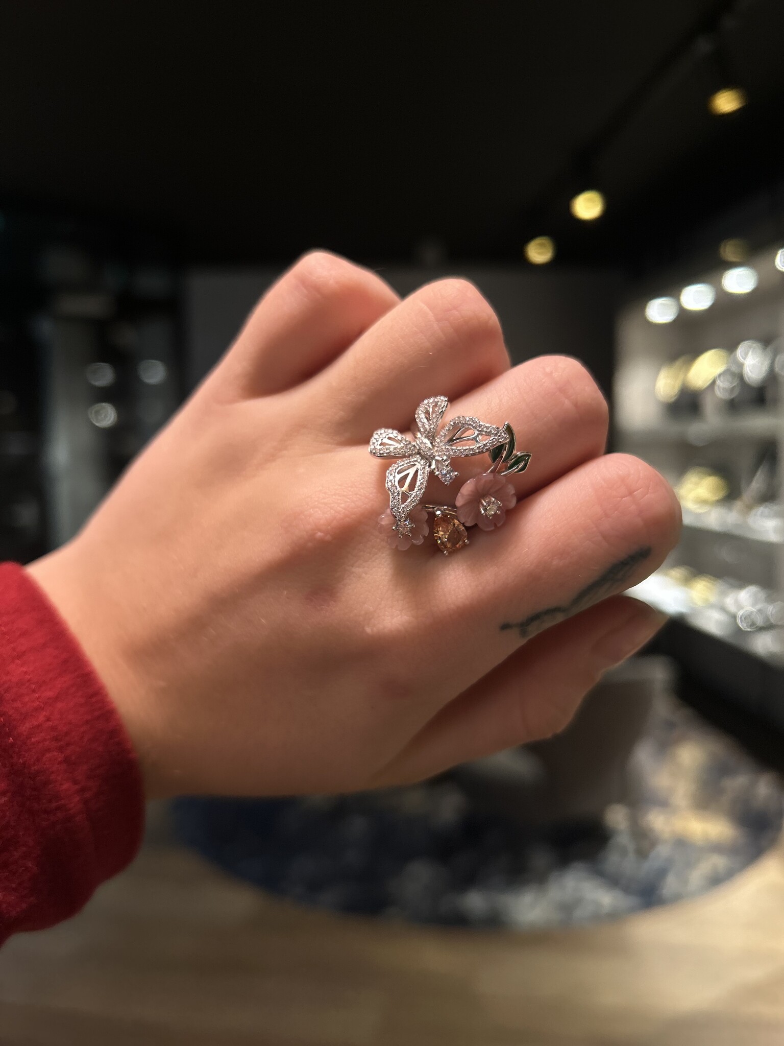 Ring bloemmotief met zirkonia stenen, oranje steen en roze onderdelen-2