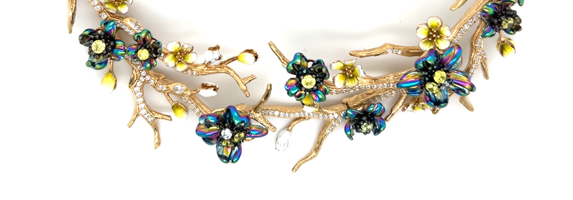 Ketting gold-plated met bloemen, takken en veel details