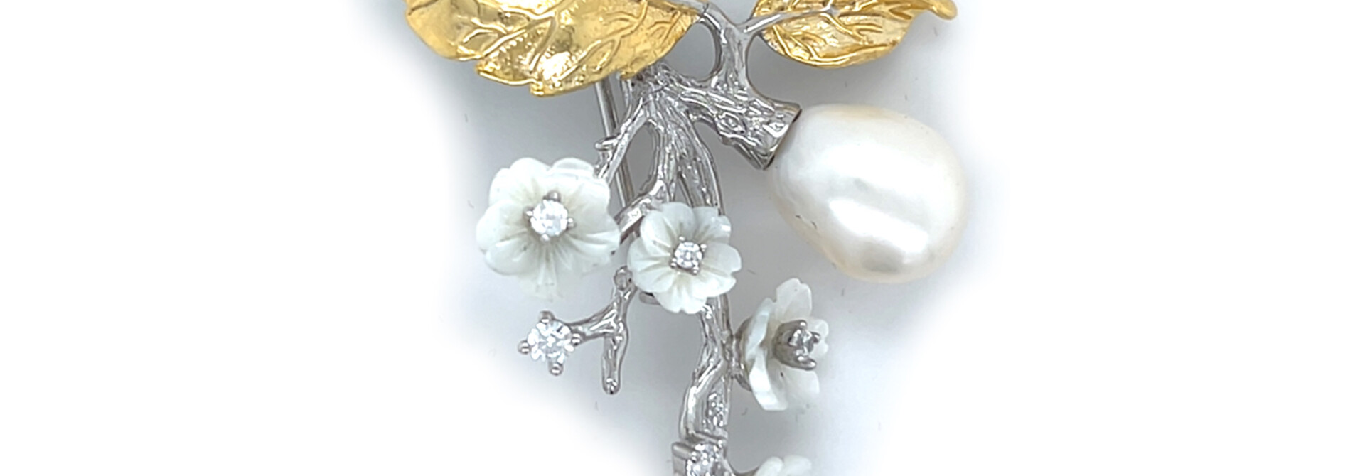 Broche gold-plated tak met parel en zirkonia's