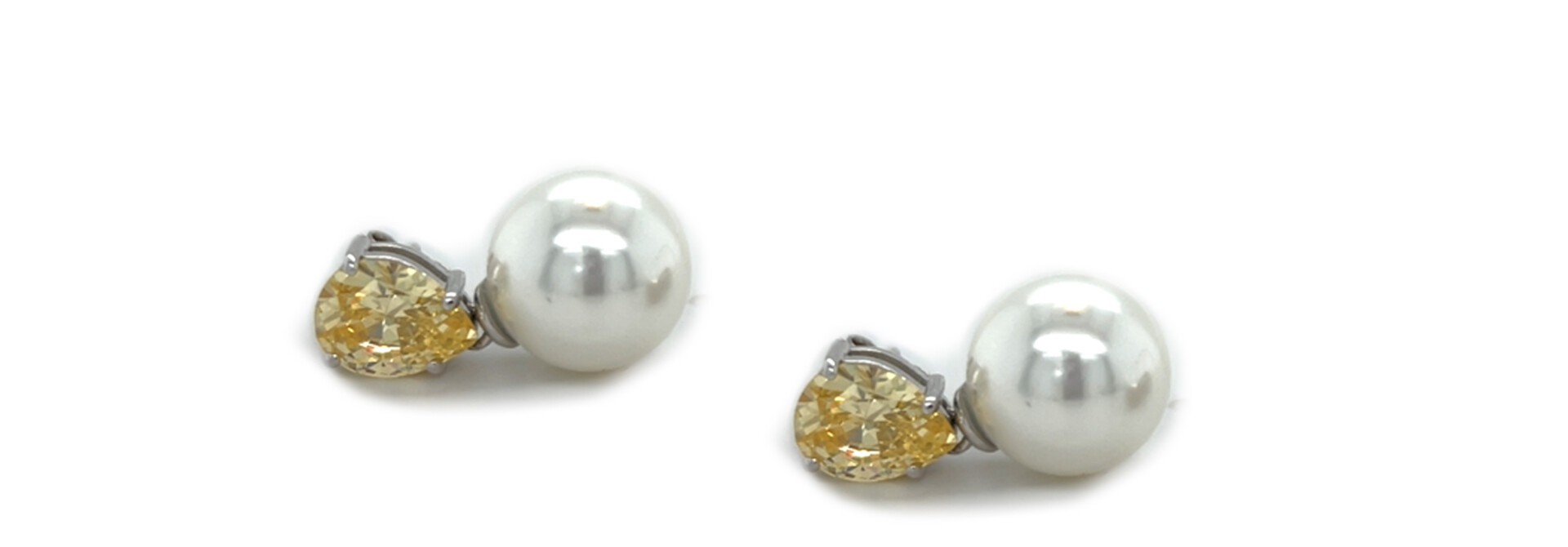 Oorbellen stekers parel met druppelvormige, gele zirkonia