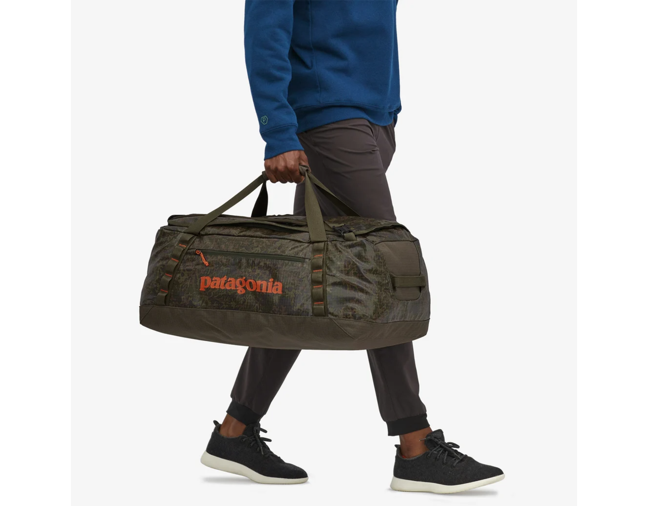 Patagonia Black Hole Duffel 55L Lichen Basin Green Behind The Pines