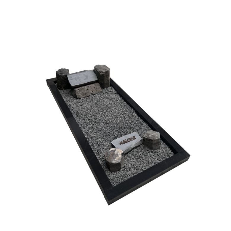 Grafstenen basaltblokken met omranding