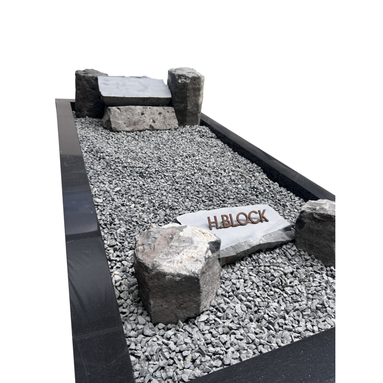 Grafstenen basaltblokken met omranding