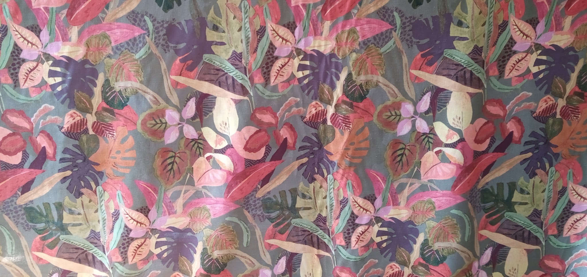 Linen clothing fabric coloured ramage on a khaki background